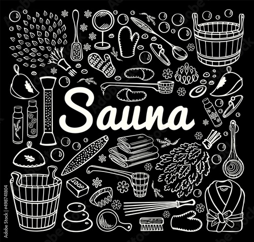 Sauna and spa accessories on black board background