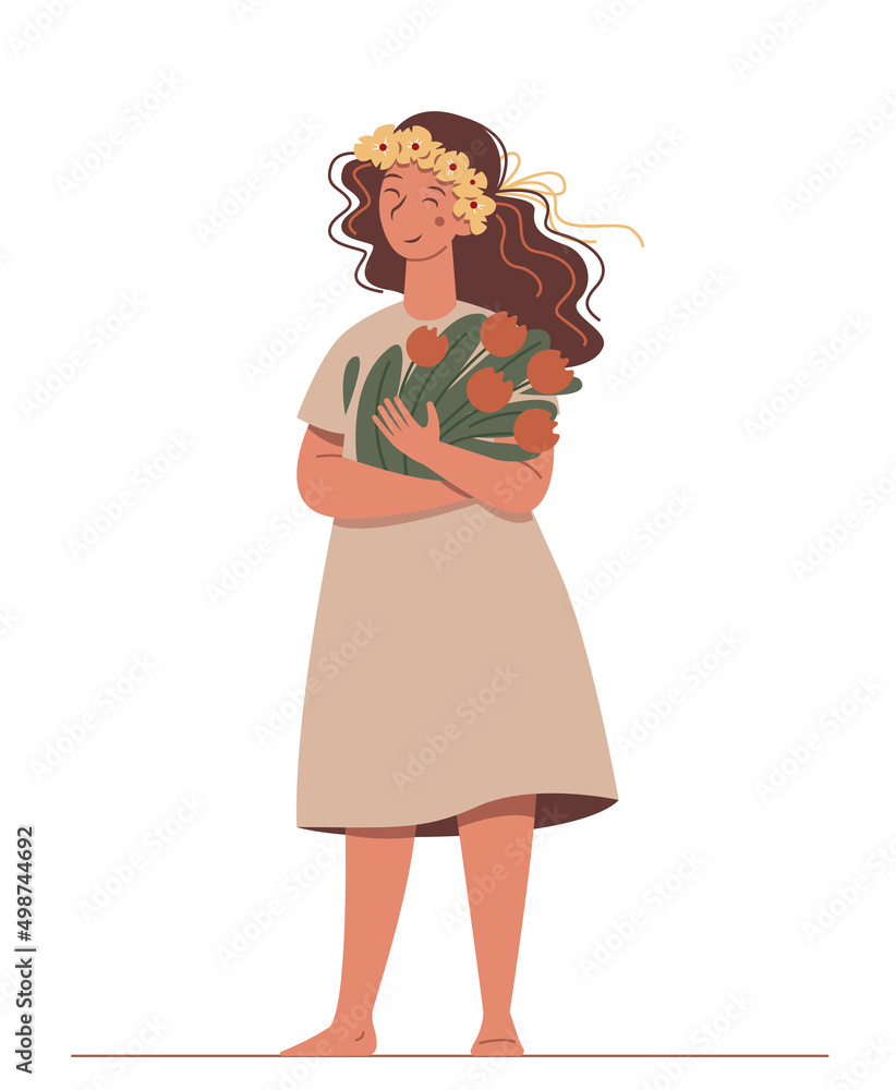 Standing joyful woman in a floral wreath holds the bouquet of flowers. Standing joyful woman in a floral wreath holds the bouquet of flowers.