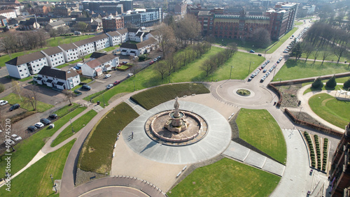 Aerial image over the Doulton Fountain in Glasgow Green, a park next to the River Clyde near the City Centre.