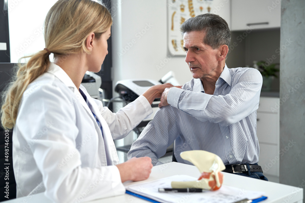 Caucasian senior man has a visit at the doctor Caucasian senior man has a visit at the doctor