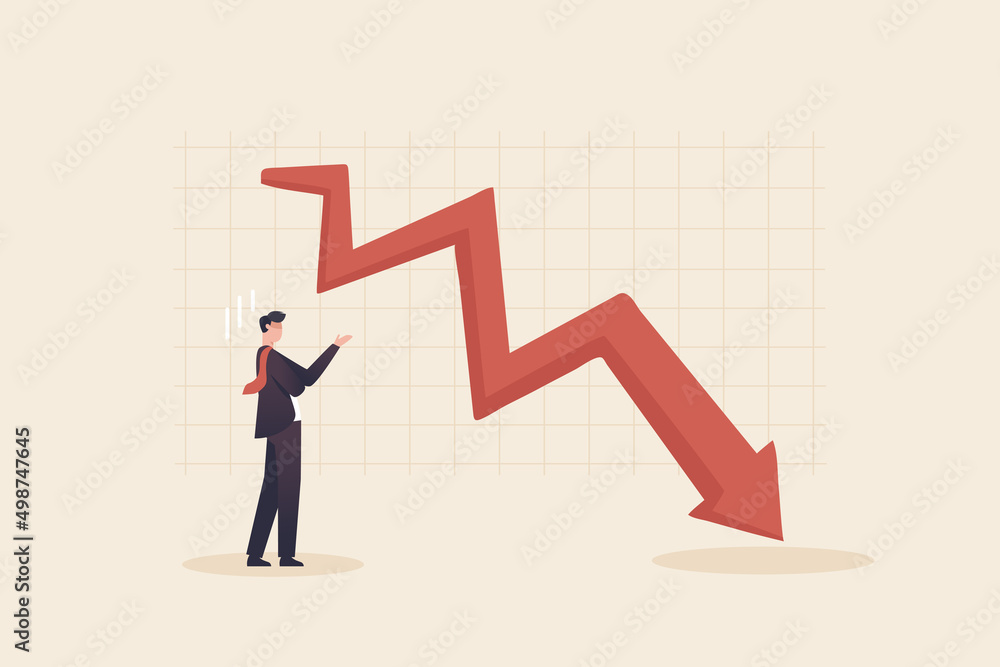 Financial Crisis , Stock Market Plunge. Businessman looks at the graph and is depressed. Financial Crisis , Stock Market Plunge. Businessman looks at the graph and is depressed.