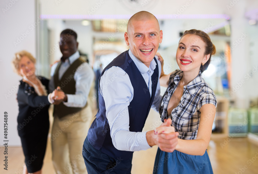 Adult dancing couple enjoying active swing Adult dancing couple enjoying active swing