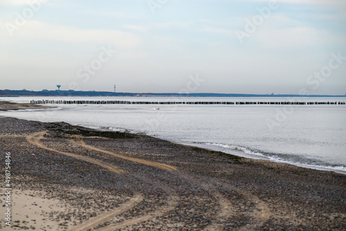 Old fishing boat pier in Baltic sea in Nida, Latvia.