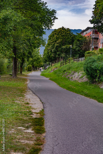 Asphalt park alleyway through the nature outside the town of Vilah