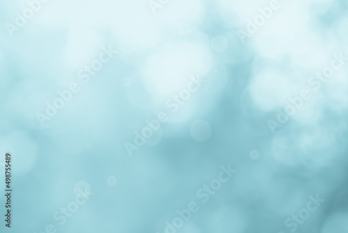 Abstract blurry blue color for background, Blur festival lights outdoor celebration and blue bokeh focus decorative. 
