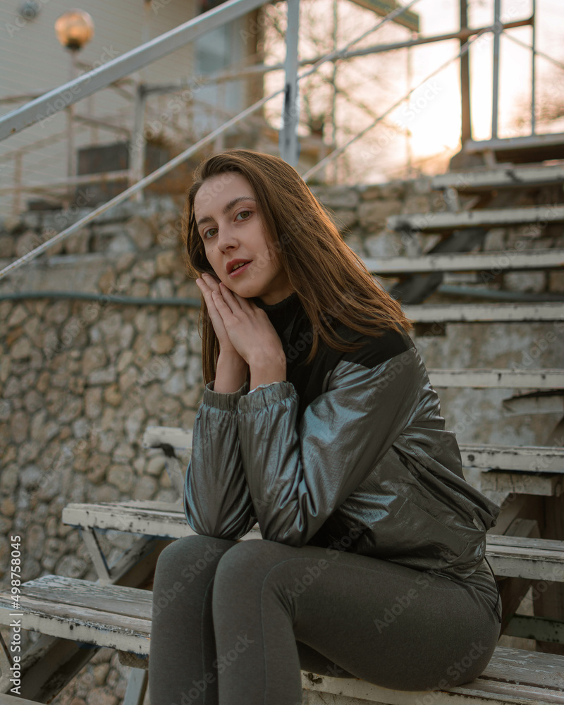 woman sitting on a bench woman sitting on a bench