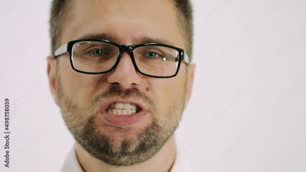 Man in glasses singing song standing alone close up Man in glasses singing song standing alone close up