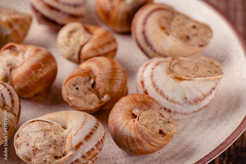 snails with butter on a plate