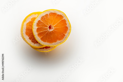  Grapefruit and grapefruit half isolated on white background. Pink,orange Fresh grapefruit citrus fruit, slice with zest