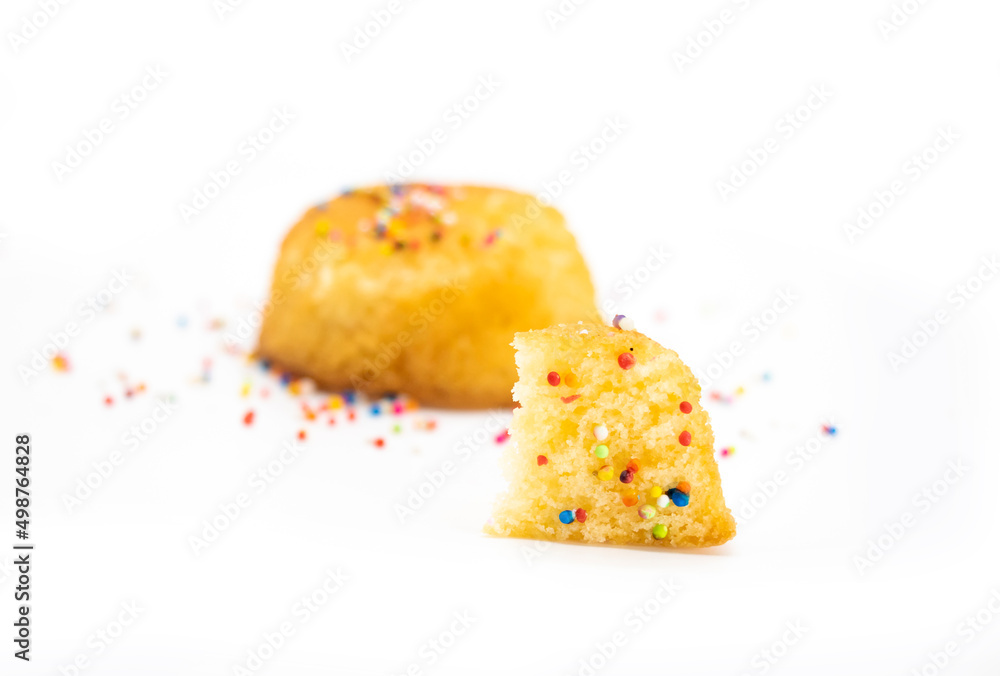 slice yellow muffin cupcake design by colourful sprinkle isolated on white background, slice yellow muffin cupcake design by colourful sprinkle isolated on white background,