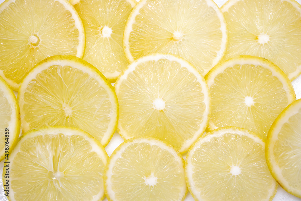 Yellow lemon slices pattern texture background. Yellow lemon slices pattern texture background.