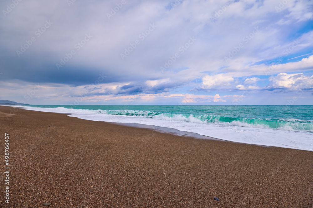 Beautiful landscape with a rocky sea shore on a sunny day Beautiful landscape with a rocky sea shore on a sunny day