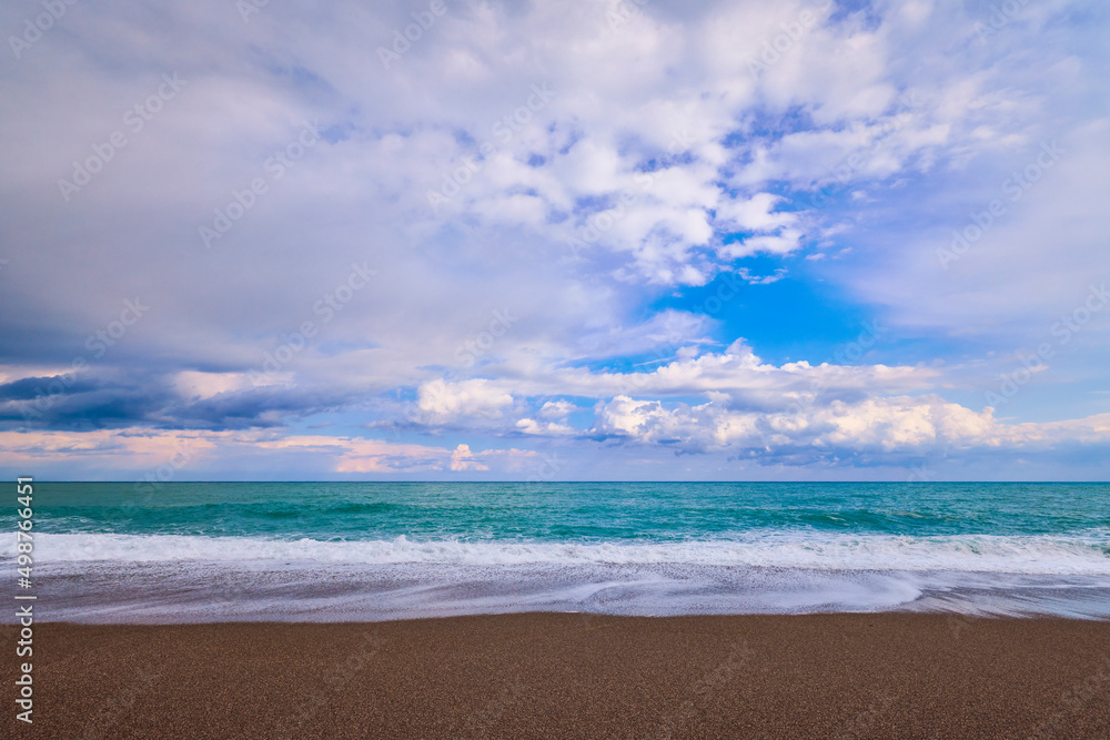 Beautiful landscape with a rocky sea shore on a sunny day