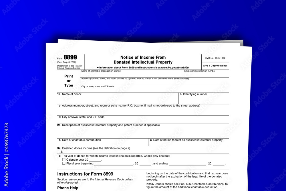 Form 8899 documentation published IRS USA 09.20.2013. American tax document on colored Form 8899 documentation published IRS USA 09.20.2013. American tax document on colored