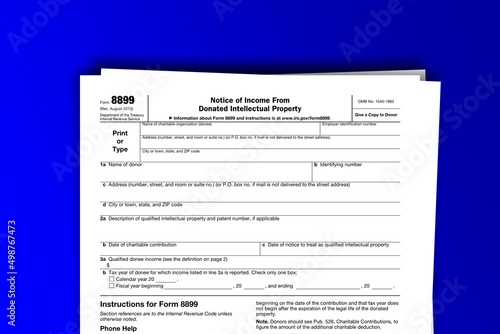 Form 8899 documentation published IRS USA 09.20.2013. American tax document on colored