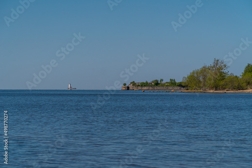 Russia. Kronstadt. May 30, 2021. The Reef Fort and Tolbukhin Lighthouse are on the horizon.