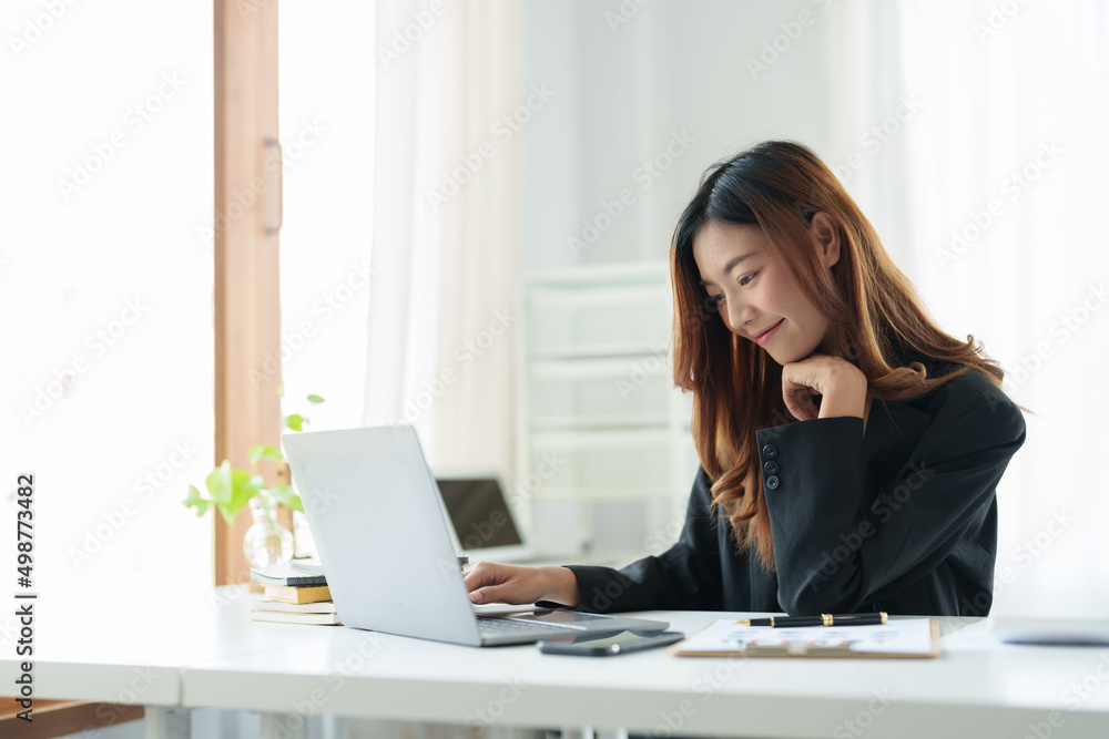 Portrait asian woman using laptop computer for online webinar or learning at home. Portrait asian woman using laptop computer for online webinar or learning at home.