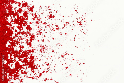 red maroon kumkum powder splash texture on white background