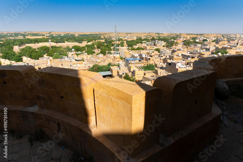 Jaisalmer,Rajasthan,India - October16,2019 : View of Jaisalmer city from inside of Jaislamer Fort or Sonar Quila or Golden Fort. UNESCO world heritage site at Thar desert along old silk trade route. photo