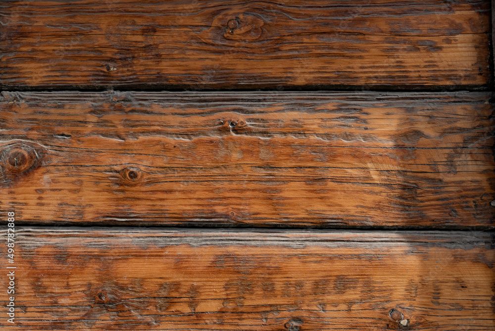 Fototapeta premium Brown wood texture background coming from natural tree. The wooden panel has a beautiful dark pattern, hardwood floor texture