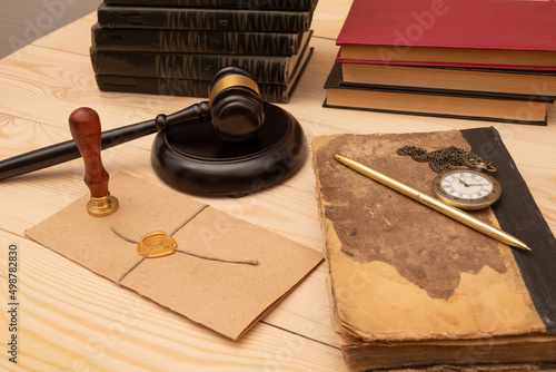 Vintage stamp, envelope and testament. Notary public tools photo