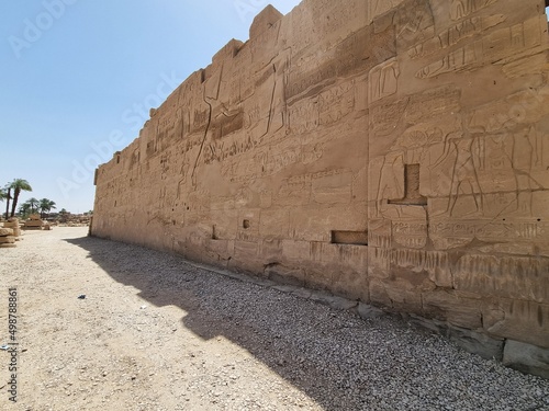 Carvings and hieroglyphics on the exterior wall  at the Karnak Temple Complex in Luxor  Egypt.