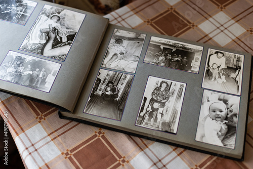 Close up of an album and ancient family photos photo