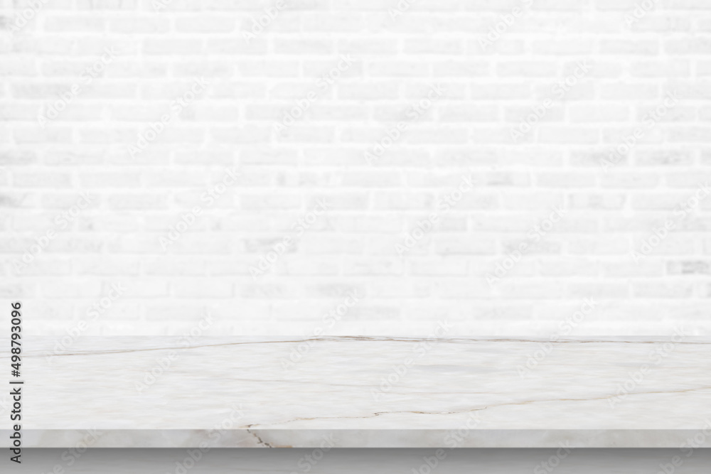 Fototapeta premium Empty white marble table top with brick wall background