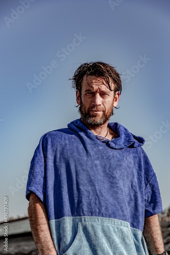 wing foil old kiter on the beach photo