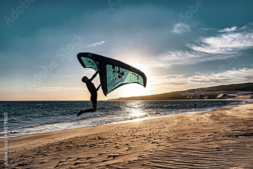 wing foil old kiter on the beach
