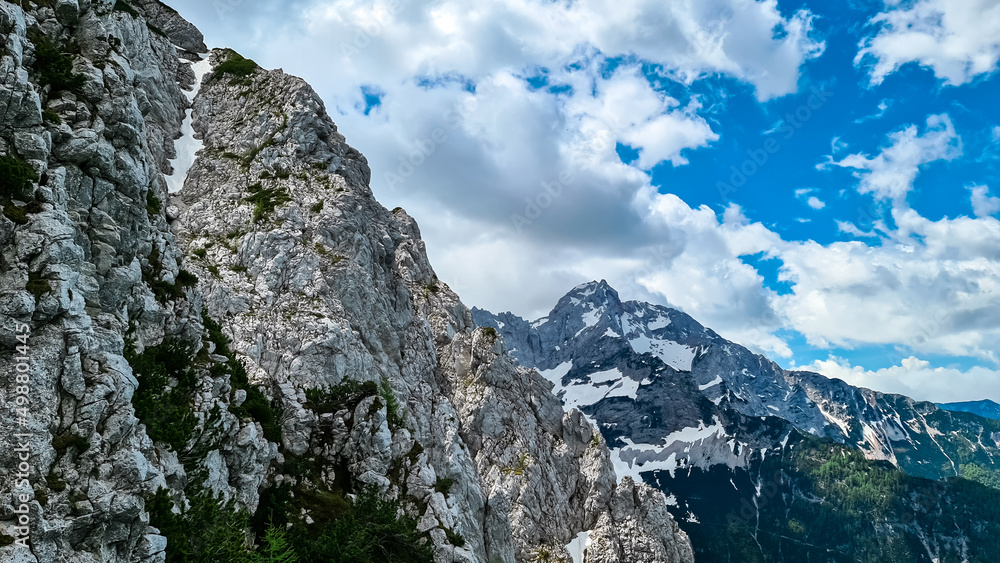 Scenic view on rocky sharp summit of Jezerska Kocna in Kamnik Savinja Alps in Carinthia, border Austria and Slovenia. Mountain peaks in the Vellacher Kotschna. Mountaineering. Freedom concept