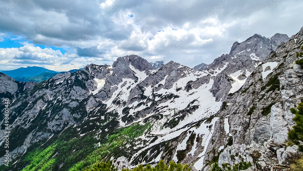 Scenic view on rocky sharp summit of Jezerska Kocna in Kamnik Savinja Alps in Carinthia, border Austria and Slovenia. Mountain peaks in the Vellacher Kotschna. Mountaineering. Freedom concept