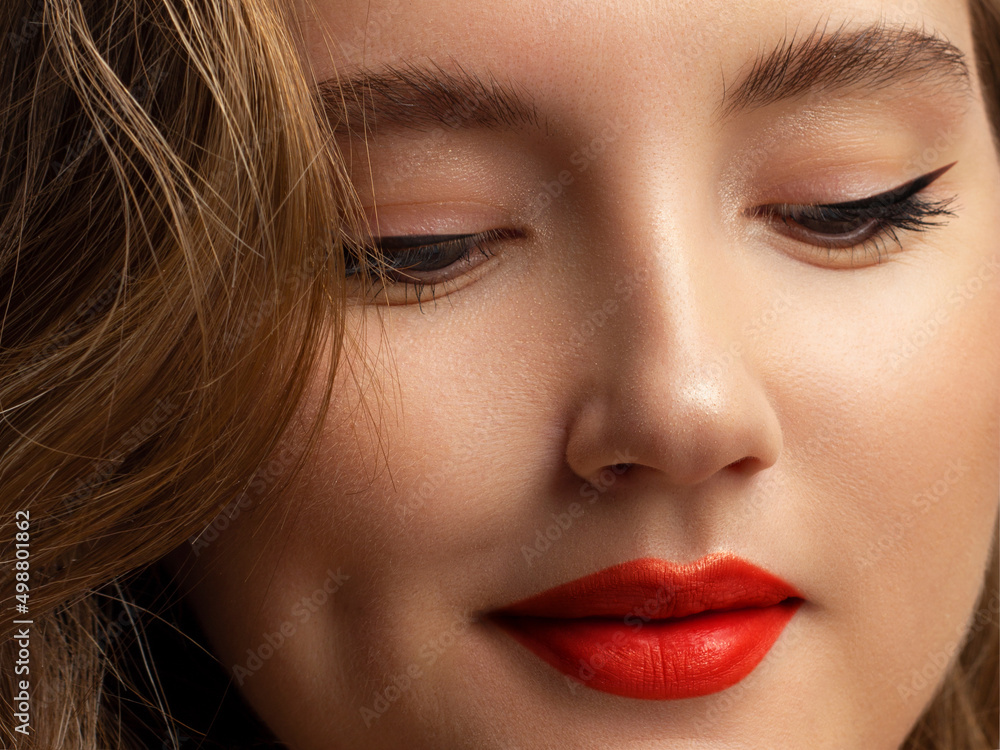Beauty Face. Beautiful Woman With Sexy Full Red Lips. Closeup Portrait Of Girl With Healthy Smooth Facial Skin Applying Lip Balm On Lip. High Resolution. cosmetology, make up, injections, spa Beauty Face. Beautiful Woman With Sexy Full Red Lips. Closeup Portrait Of Girl With Healthy Smooth Facial Skin Applying Lip Balm On Lip. High Resolution. cosmetology, make up, injections, spa