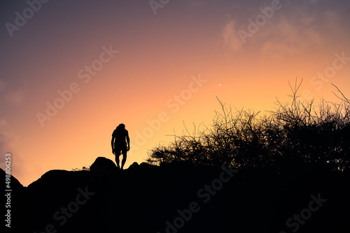 Man hiking cross country 