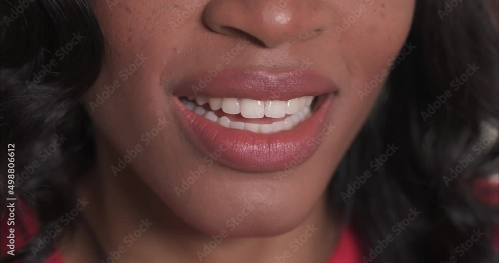 Close up of a black woman mouth speaking. Close up of a black woman mouth speaking.