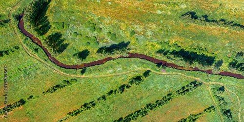 Winding river in a field to...