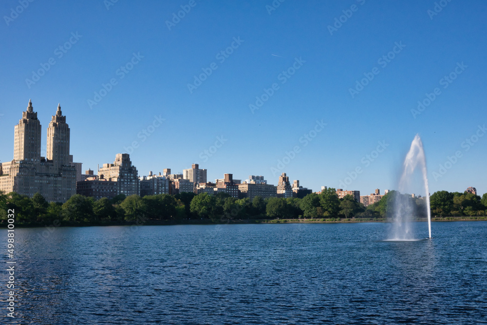 Jacqueline Kennedy Onassis Reservoir at Central Park NY with Manhattan skyline