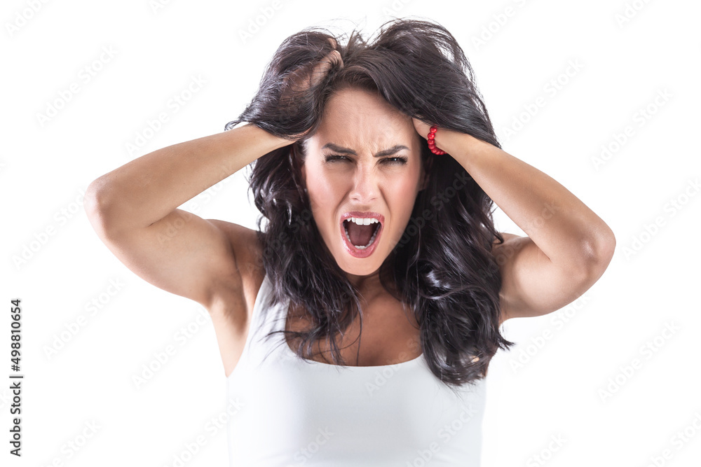 Brunette woman holding her head because of strong headache. Isolated background