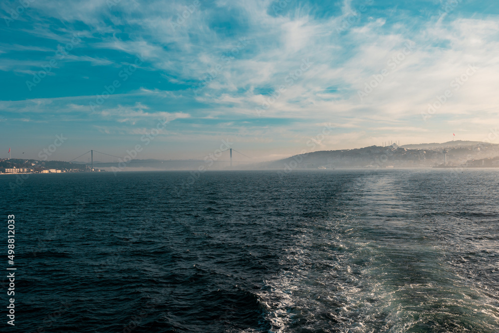 Istanbul view from a ferry at foggy weather in the morning. Istanbul view from a ferry at foggy weather in the morning.