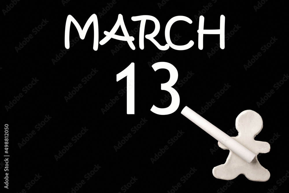 13th day of March. A small white plasticine man writing the date 13 March on a black board. Business concept. Education concept. Spring month, day of the year concept. 13th day of March. A small white plasticine man writing the date 13 March on a black board. Business concept. Education concept. Spring month, day of the year concept.