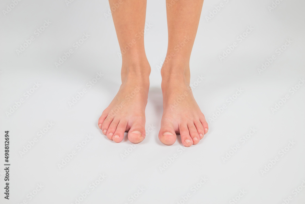 feet on a white background, front view. feet on a white background, front view.