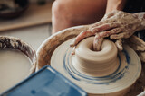 Close Up of Potter Master at Work in Clay Studio, Handmade Process on a Pottery Wheel