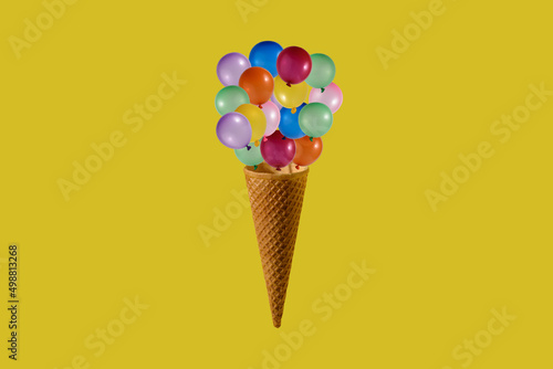 Ice cream cone and colorful balloons.