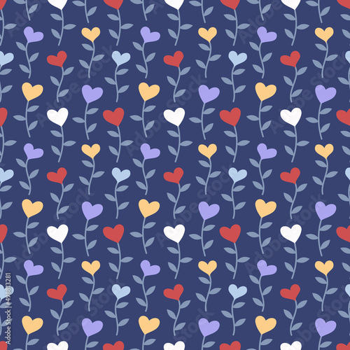 Seamless pattern with multicolored hearts