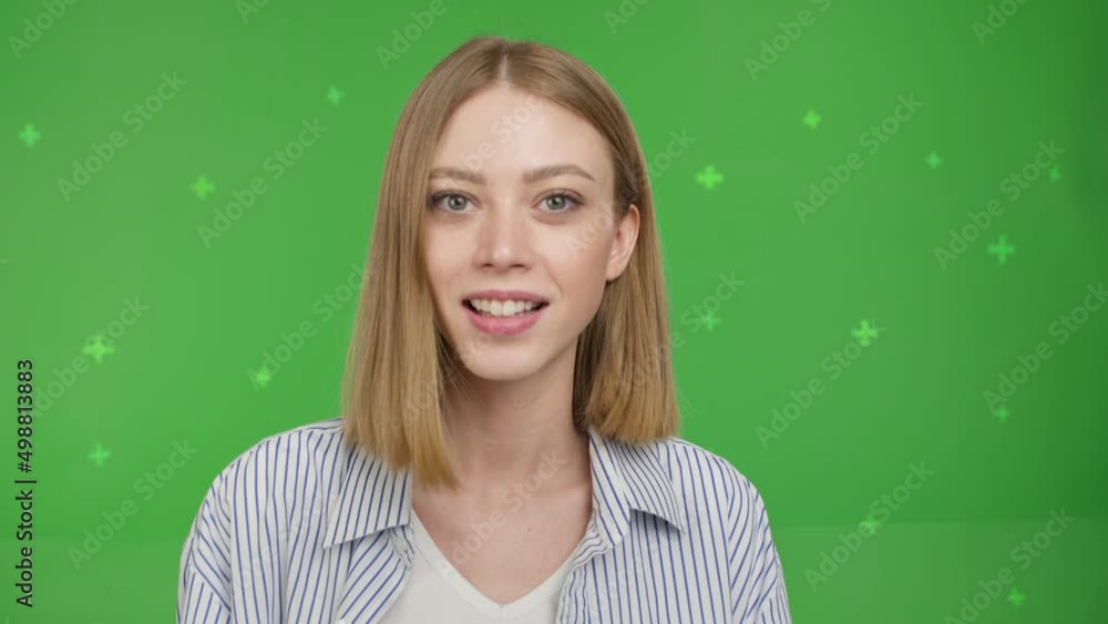 Happy pretty caucasian girl smiling face and talking to webcam make video call at home talking chatting by virtual video call zoom app online videocall meeting on green screen background. Chroma key