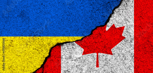 Ukraine and Canada flags. Support and help, weapons and military equipment, partnership and diplomacy, humanitarian aid and donations for Ukrainian refugees