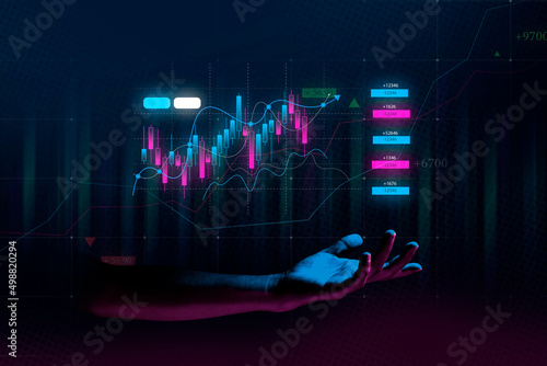 Businessman hand finance business chart of metaverse technology financial graph investment