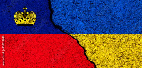 Ukraine and Liechtenstein flags. Support and help, weapons and military equipment, partnership and diplomacy, humanitarian aid and donations for Ukrainian refugees