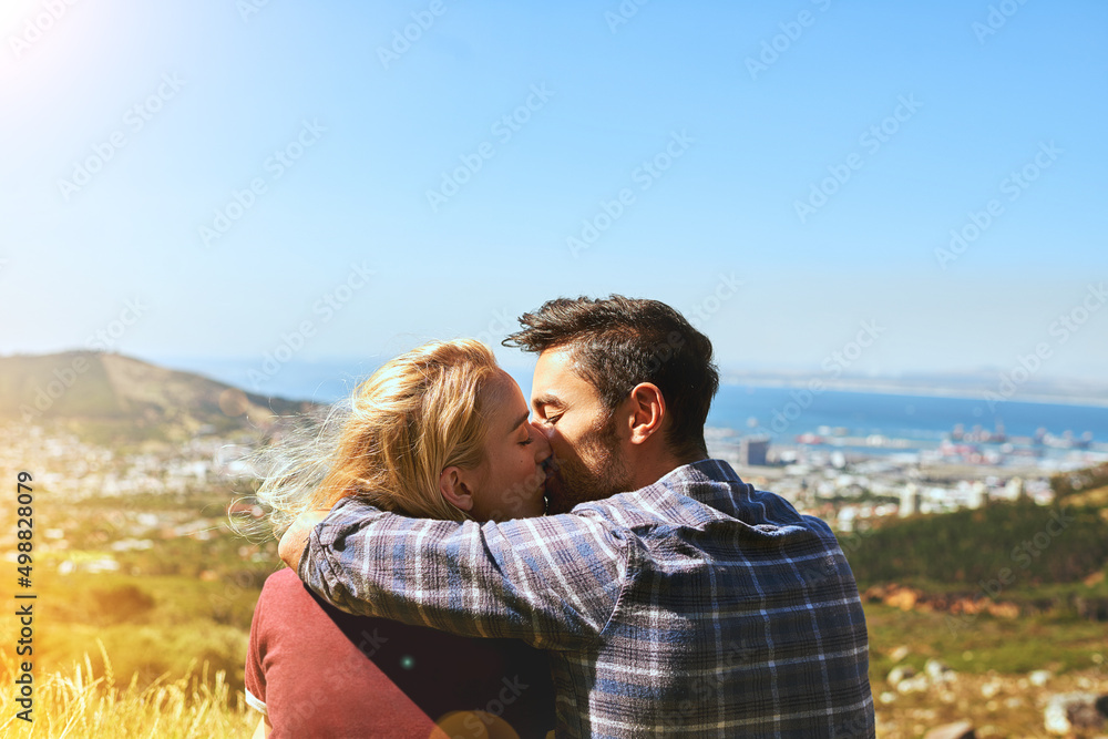 Its about who you share it with.... Shot of an affectionate young couple enjoying a day outdoors. Its about who you share it with.... Shot of an affectionate young couple enjoying a day outdoors.