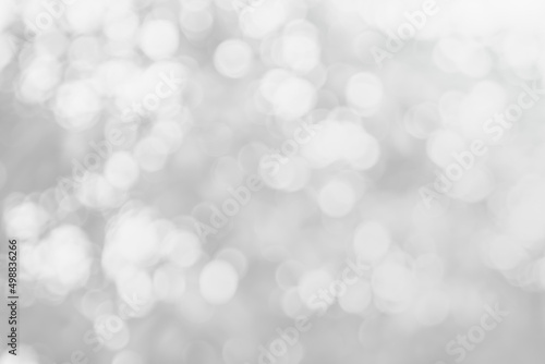 Abstract blurry grey color for background, Blur festival lights outdoor celebration and white bokeh focus texture decorative design elegant for winner.
